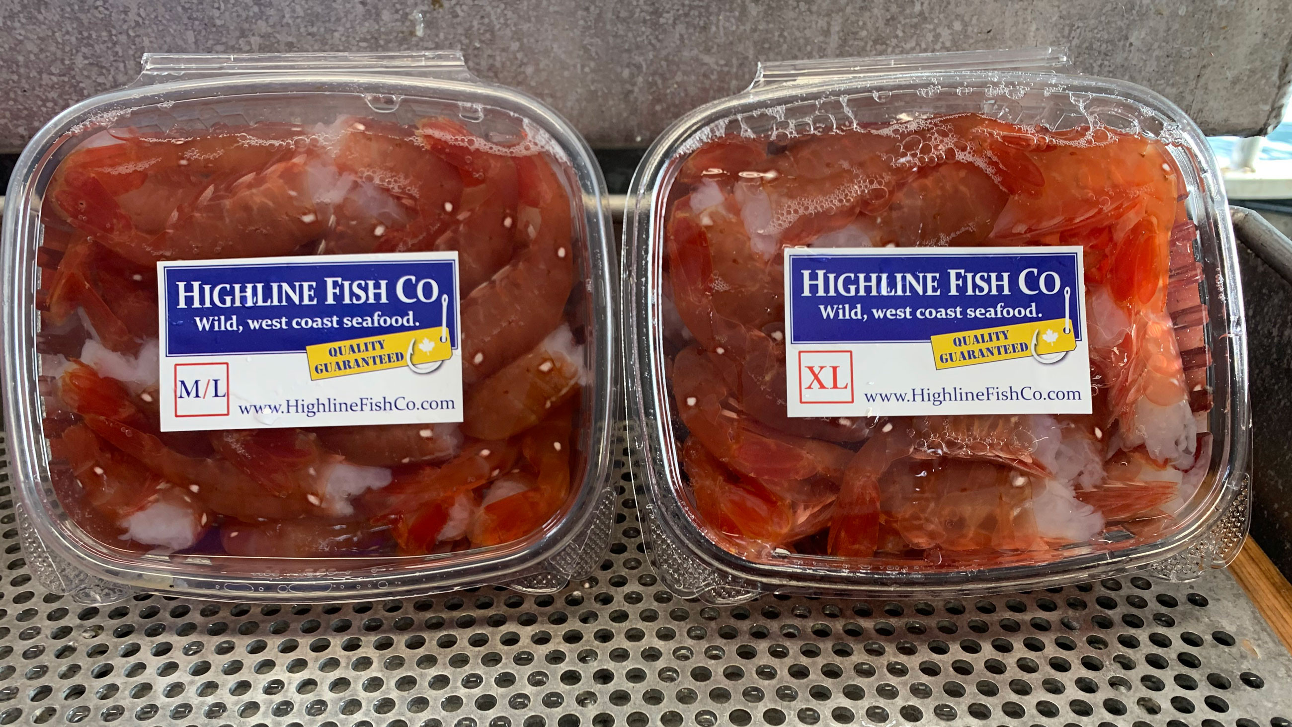 Two tubs of frozen prawns